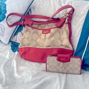 Matching coach purse and wallet. Light cream and coral